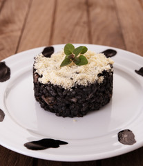 Black risotto with parmesan