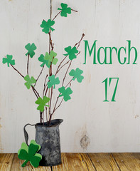 Saint Patrick's Day tree of shamrocks in vintage tin pitcher