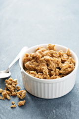 Peanut butter granola in white ramekin
