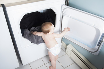 Little baby in the washing machine