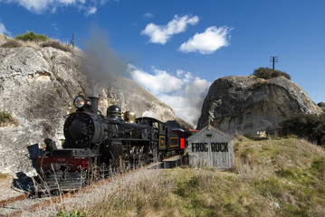 Steam train passing Frog Rock, Canterbury, South Island,New Zealand