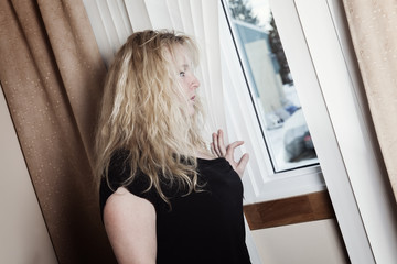 Woman depress window