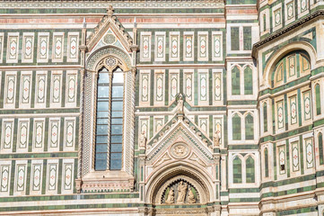 Fototapeta na wymiar A detail of the facade of the Duomo cathedral in Florence, with