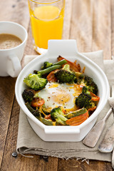 Baked vegetables with an egg on top