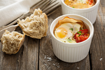 Baked eggs in small ramekin