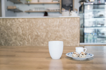 Coffee and scone in cafe in vintage color