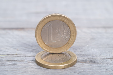 Euro coins on a wooden table