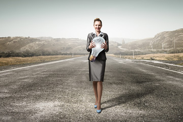 Woman with big bulb in hands