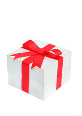 Red bow gift on white background.