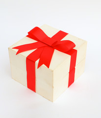 Red bow gift on white background.