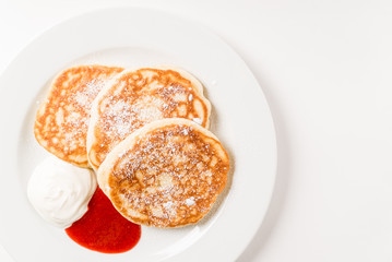 tasty pancakes with sour cream and jam