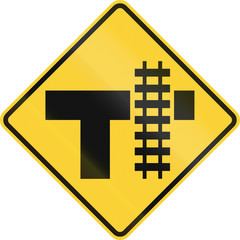 Fototapeta premium United States MUTCD road sign - Level crossing and intersection
