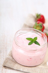 Strawberry yogurt and ripe strawberry