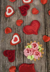 Hearts on a wooden background.