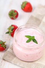 Strawberry yogurt and ripe strawberry