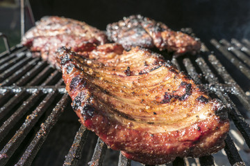 Close Up Marinated Pork Ribs on Outside Barbecue Grill
