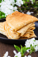 Crepes  folded in triangles in frying pan