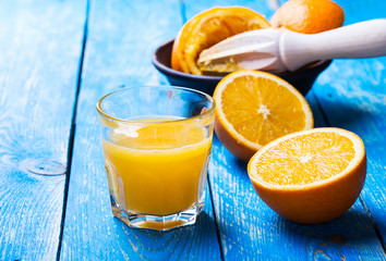 Fresh orange juice and oranges