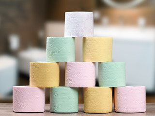 Multi-colored toilet paper. Many colorful rolls of toilet paper - pink, green, white, yellow. Conceptually - diversity, choice. 