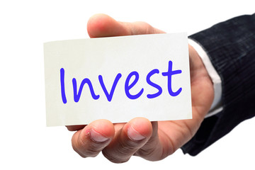 Hand writing Invest  message.