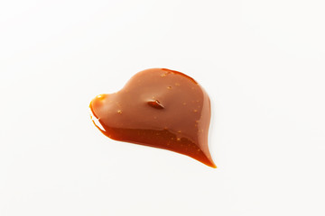 caramel decor heart shaped  on white