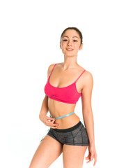 Fototapeta premium Young slim woman with centimeter