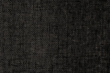 Old used rough wooden cutting board with horizontal slots and handle on wooden table background