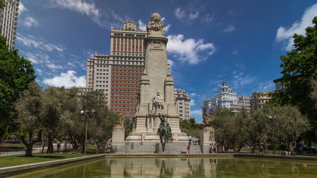 View of the stone sculpture of Miguel de Cervantes timelapse hyperlapse and bronze sculptures of Don Quixote and Sancho Panza on the Square of Spain 