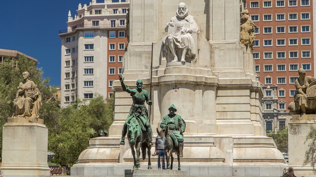 View of the stone sculpture of Miguel de Cervantes timelapse hyperlapse and bronze sculptures of Don Quixote and Sancho Panza on the Square of Spain 