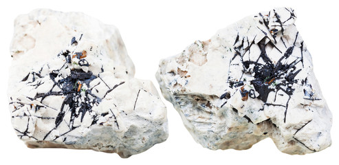 two pieces of dolomite rock with Ilmenite crystals