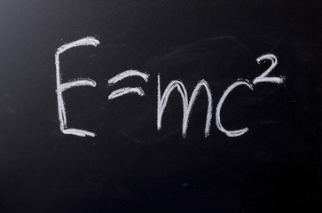 E equals mc squared on chalkboard