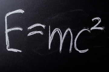 E equals mc squared on chalkboard