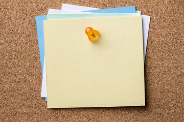 Blank papers pinned on bulletin board