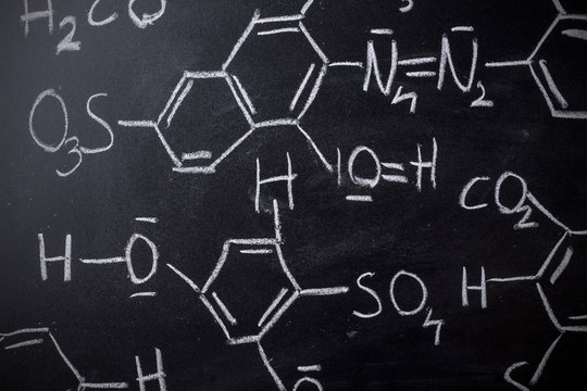 Chemical formula on blackboard - handwritten
