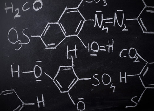 Chemical formula on blackboard - handwritten