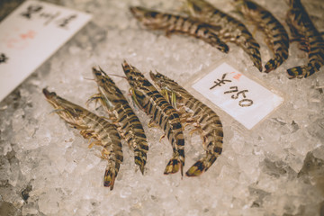 King prawn, Large king prawn put selling on ice in fresh market with price tag in Japanese market, Osaka, Japan