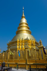 Fototapeta premium Golden Pagoda Attractions in ChiangMai.