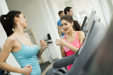 Fototapeta premium Young people training in the gym