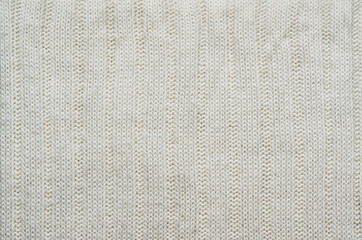 Fototapeta na wymiar White knitted sweater texture background. Space for copy, text, lettering.