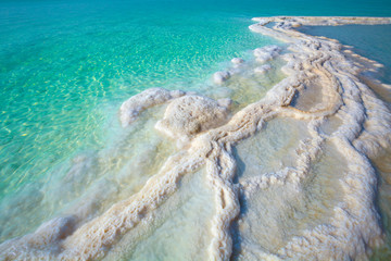 Fototapeta na wymiar Texture of Dead sea. Salt sea shore