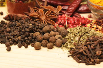 Wooden table of colorful spices