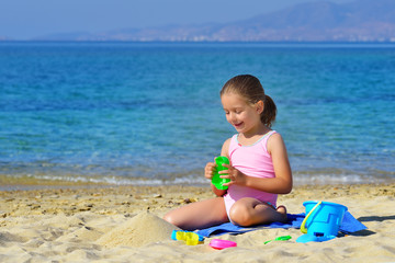 Fototapeta premium Real toddler girl enjoying her summer vacation