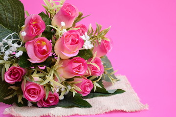 Obraz na płótnie Canvas Close-up artificial pink roses. 