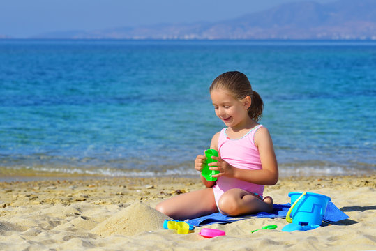 Real toddler girl enjoying her summer vacation