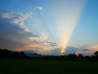 Radial sunlight through the clouds