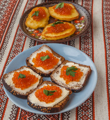 Sandwiches with red caviar  on the table