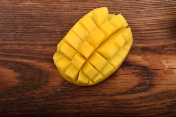 Mango fruit ripe on wood background