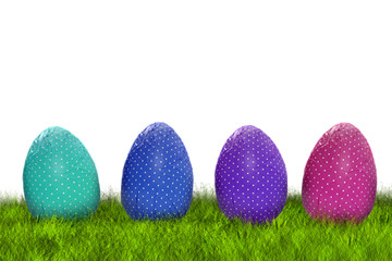 Wrapped Easter eggs on grass