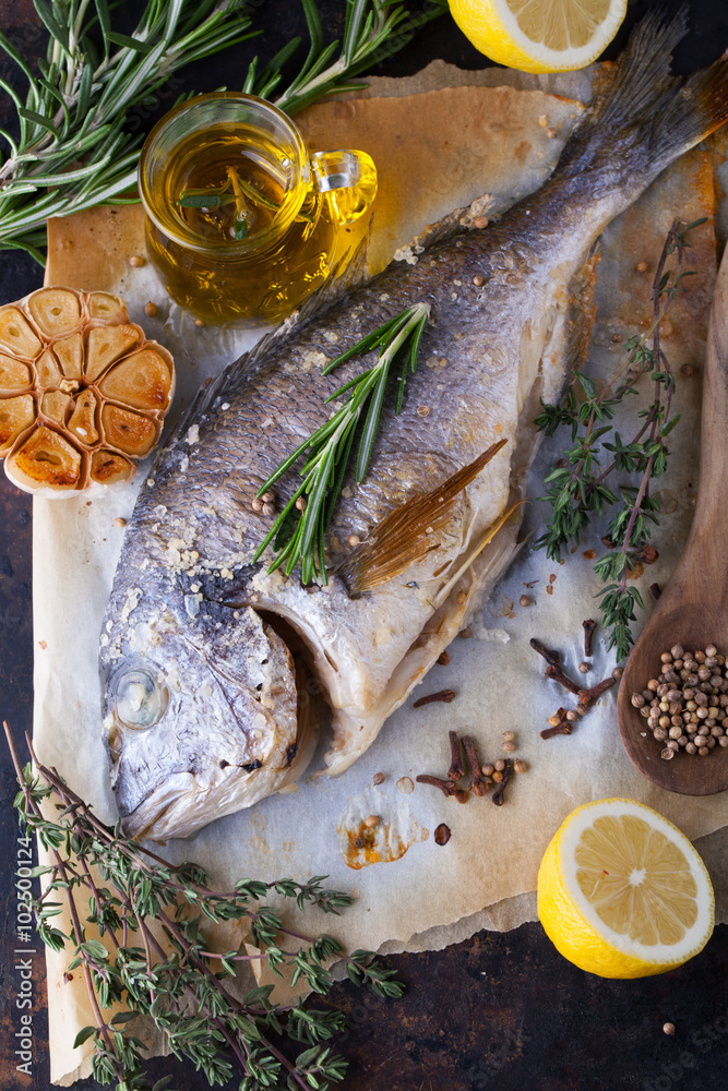 Canvas Prints grilled sea bream with aromatic spices, herbs and lemon