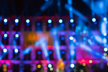 Fototapeta na wymiar Stage lights colorful blurred background